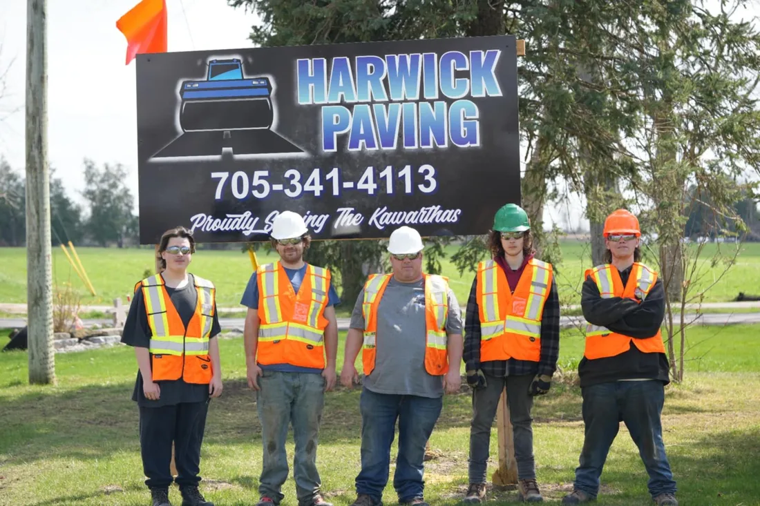 The Harwick Paving crew with a company truck in Kawartha Lakes